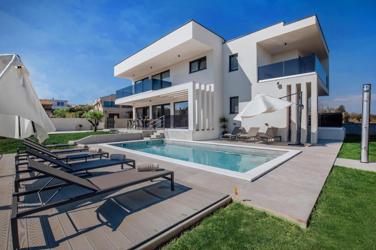 Villa Andris - new luxury villa with pool, close to the sandy beach