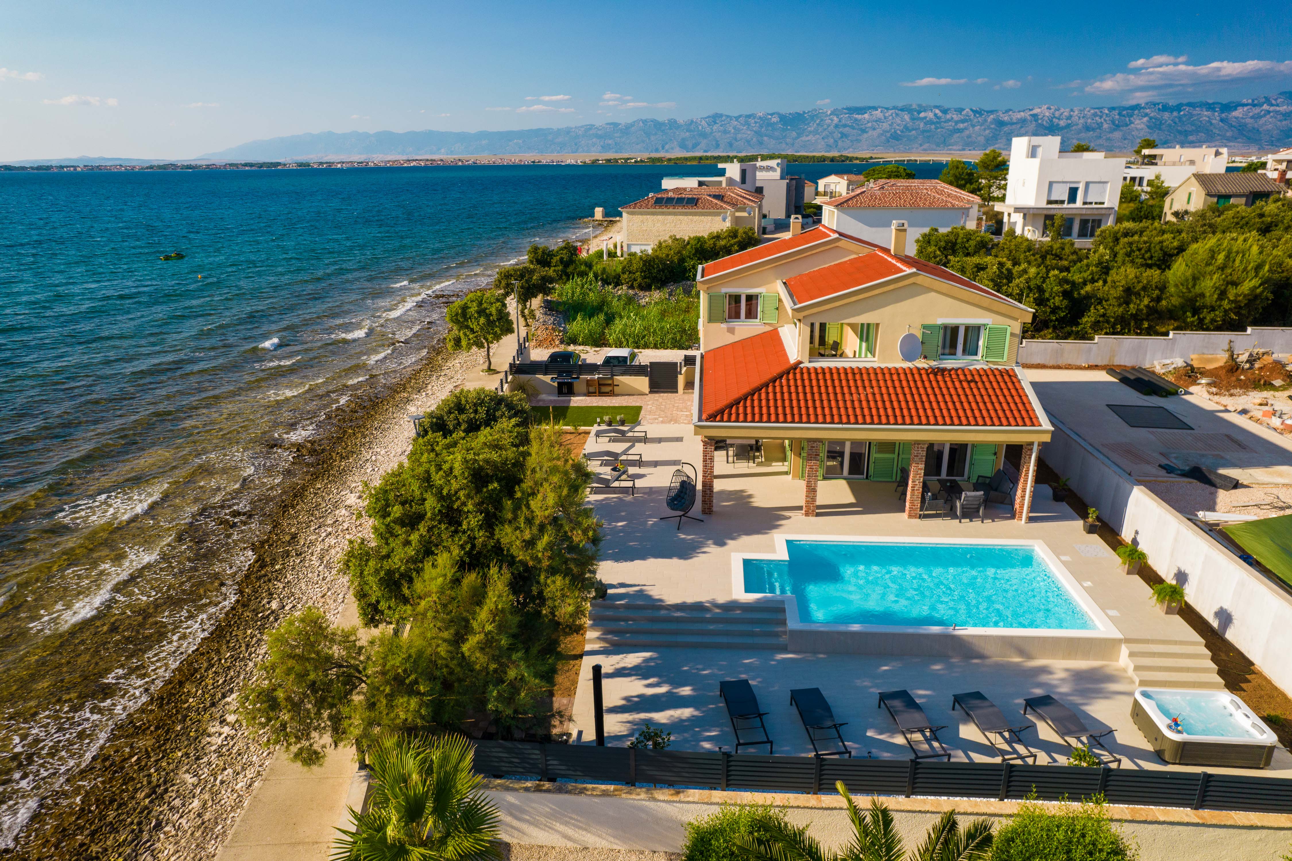 Beach front villa with heated pool, jacuzzi, fantastic view