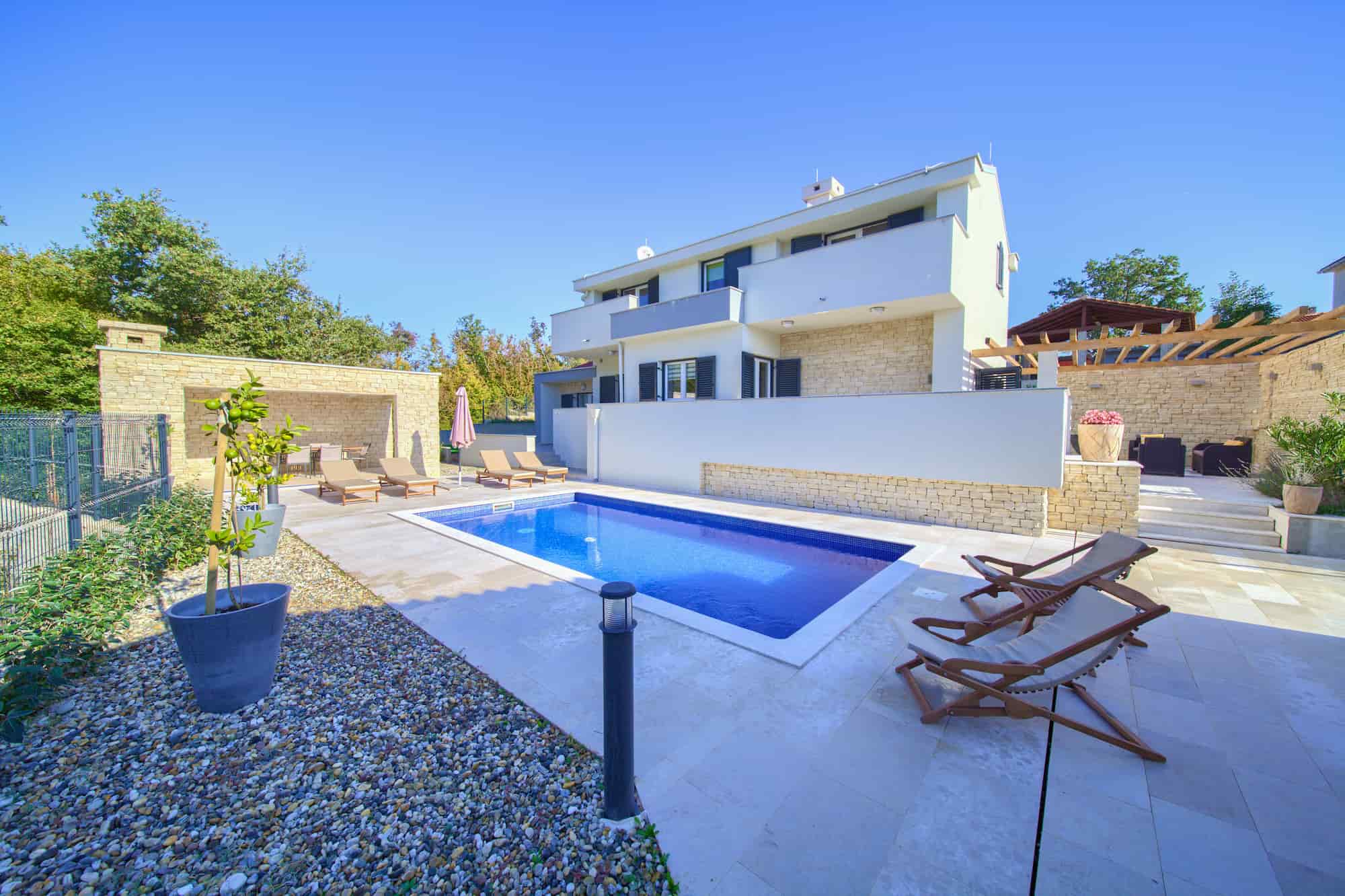 Villa with swimming pool near the sandy beach, quiet area